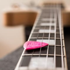 Le médiator pour guitare